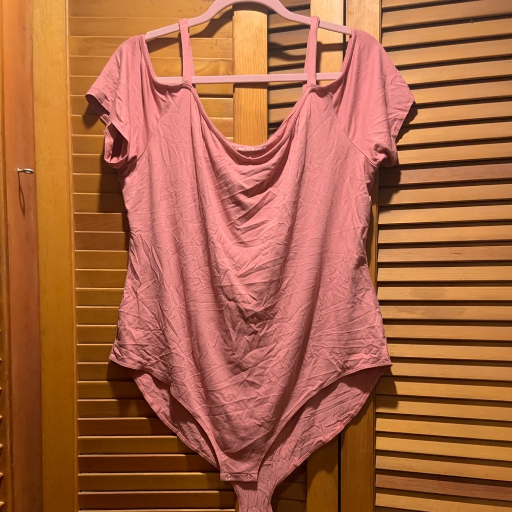 Pink shoulder cut out body suit